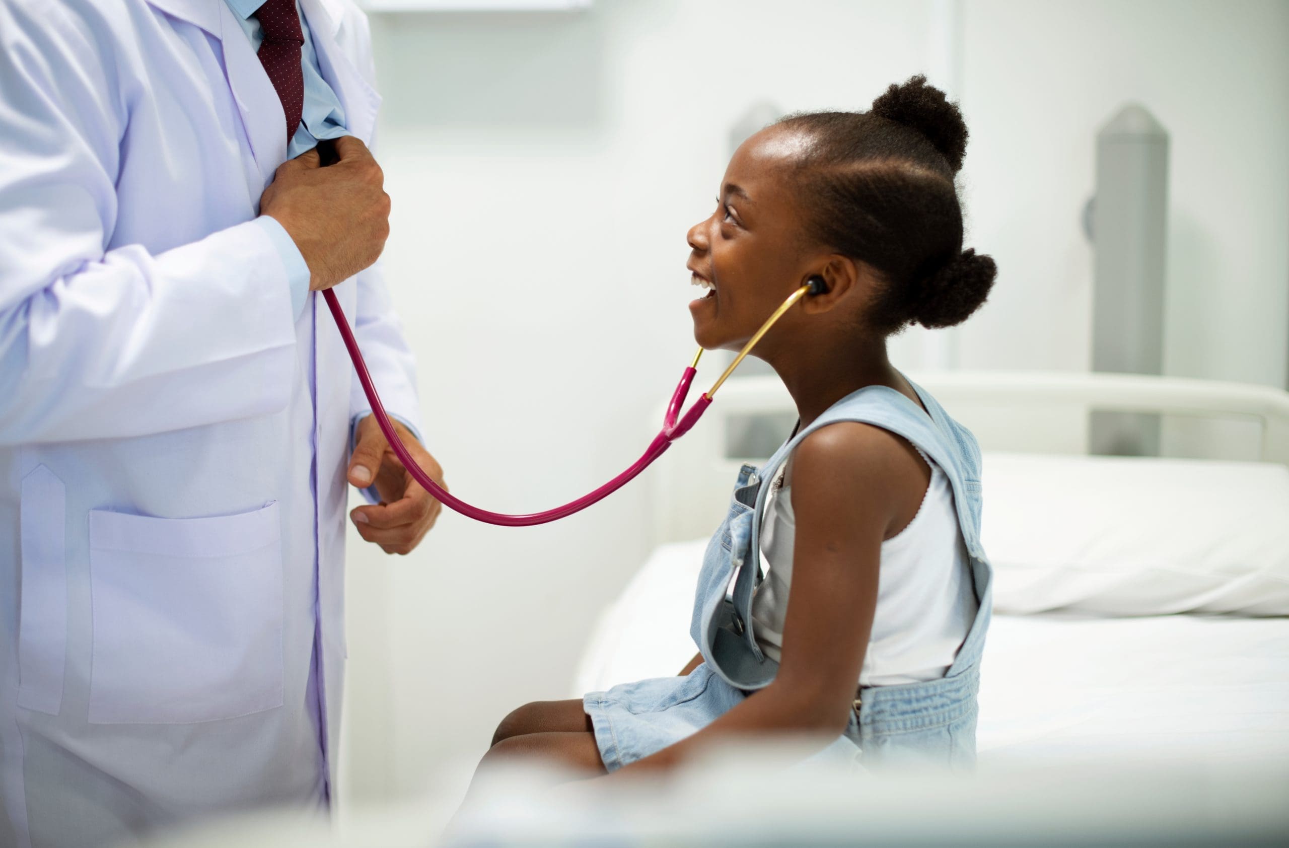 child receiving wellness check up